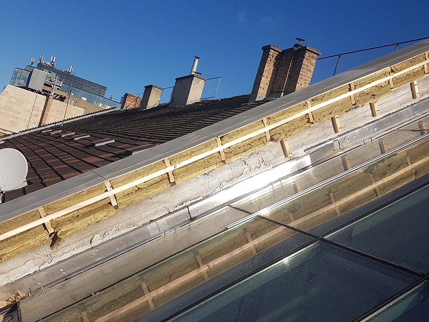 Roof insulation, glass wool then concrete slab